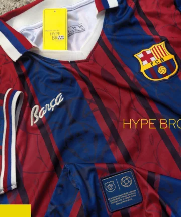 Close-up of FC Barcelona crest and 125 years anniversary embroidery on jersey